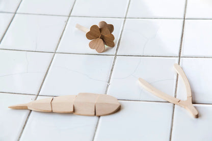 areaware good luck charm (feather)