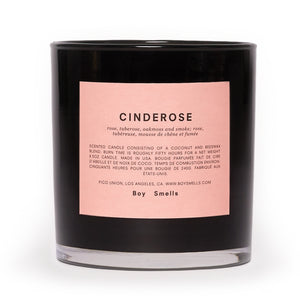 boy smells cinderose scented candle